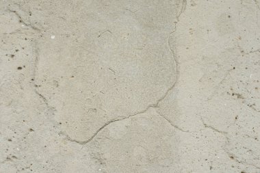 Çizikler ve çatlaklar ile duvar parçası. Arka plan olarak kullanılabilir