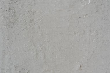 Çizikler ve çatlaklar ile duvar parçası. Arka plan olarak kullanılabilir