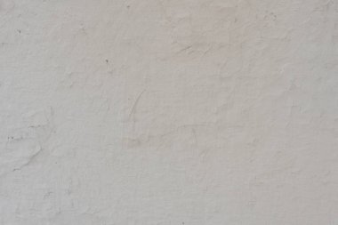 Çizikler ve çatlaklar ile duvar parçası. Arka plan olarak kullanılabilir