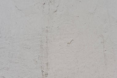 Çizikler ve çatlaklar ile duvar parçası. Arka plan olarak kullanılabilir