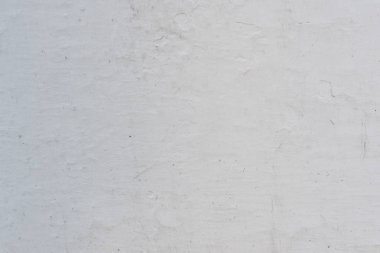 Çizikler ve çatlaklar ile duvar parçası. Arka plan olarak kullanılabilir