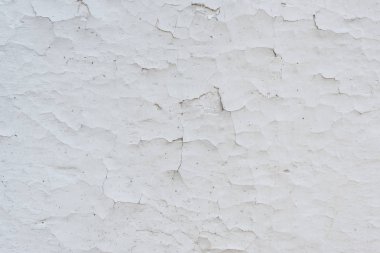 Çizikler ve çatlaklar ile duvar parçası. Arka plan olarak kullanılabilir