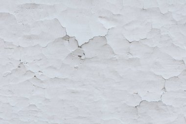 Çizikler ve çatlaklar ile duvar parçası. Arka plan olarak kullanılabilir