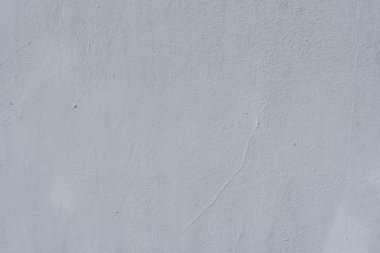 Çizikler ve çatlaklar ile duvar parçası. Arka plan olarak kullanılabilir