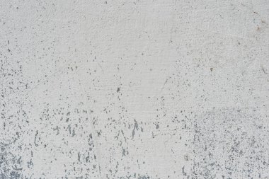 Çizikler ve çatlaklar ile duvar parçası. Arka plan olarak kullanılabilir