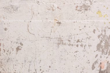 Çizikler ve çatlaklar ile duvar parçası. Arka plan olarak kullanılabilir