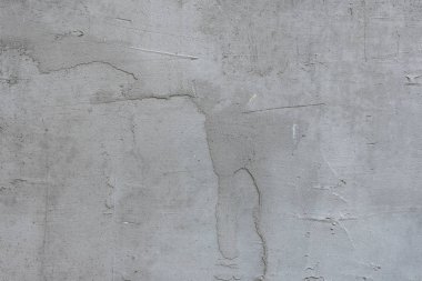 Çizikler ve çatlaklar ile duvar parçası. Arka plan olarak kullanılabilir