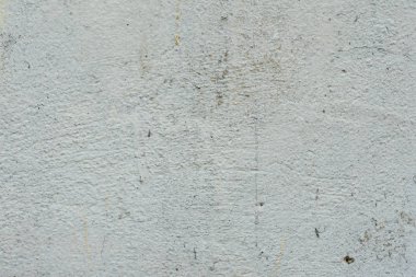Çizikler ve çatlaklar ile duvar parçası. Arka plan olarak kullanılabilir