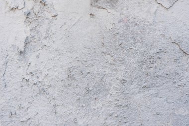 Çizikler ve çatlaklar ile duvar parçası. Arka plan olarak kullanılabilir