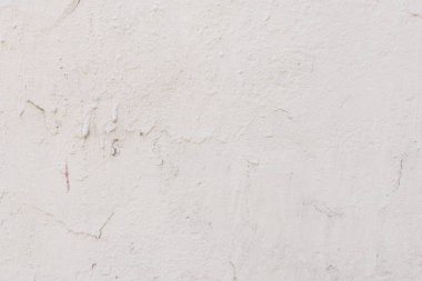 Çizikler ve çatlaklar ile duvar parçası. Arka plan olarak kullanılabilir