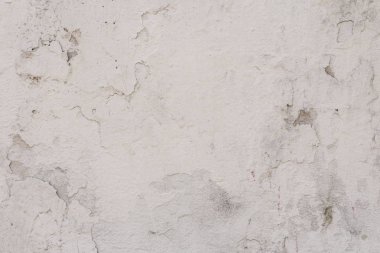 Çizikler ve çatlaklar ile duvar parçası. Arka plan olarak kullanılabilir