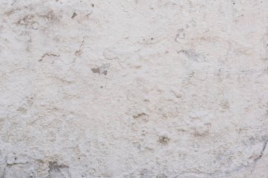 Çizikler ve çatlaklar ile duvar parçası. Arka plan olarak kullanılabilir