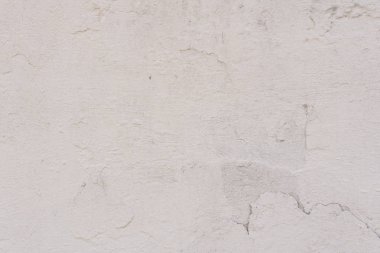 Çizikler ve çatlaklar ile duvar parçası. Arka plan olarak kullanılabilir