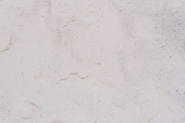 Çizikler ve çatlaklar ile duvar parçası. Arka plan olarak kullanılabilir