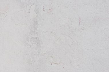 Çizikler ve çatlaklar ile duvar parçası. Arka plan olarak kullanılabilir