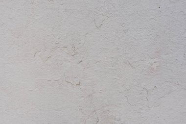 Çizikler ve çatlaklar ile duvar parçası. Arka plan olarak kullanılabilir