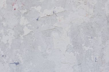 Çizikler ve çatlaklar ile duvar parçası. Arka plan olarak kullanılabilir