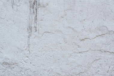 Çizikler ve çatlaklar ile duvar parçası. Arka plan olarak kullanılabilir