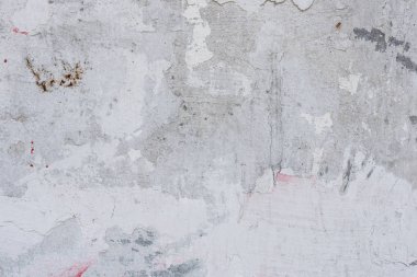 Çizikler ve çatlaklar ile duvar parçası. Arka plan olarak kullanılabilir