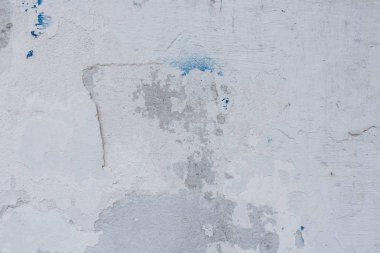 Çizikler ve çatlaklar ile duvar parçası. Arka plan olarak kullanılabilir