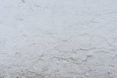 Çizikler ve çatlaklar ile duvar parçası. Arka plan olarak kullanılabilir