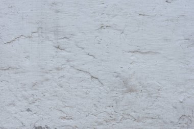 Çizikler ve çatlaklar ile duvar parçası. Arka plan olarak kullanılabilir