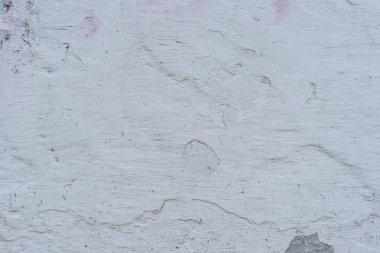 Çizikler ve çatlaklar ile duvar parçası. Arka plan olarak kullanılabilir