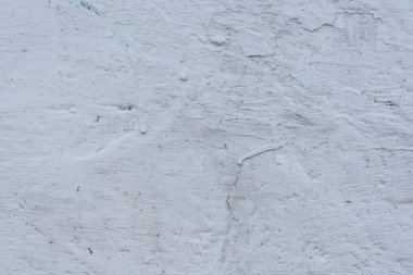 Çizikler ve çatlaklar ile duvar parçası. Arka plan olarak kullanılabilir