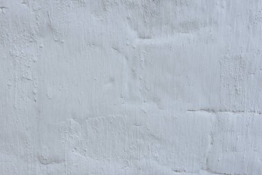 Çizikler ve çatlaklar ile duvar parçası. Arka plan olarak kullanılabilir