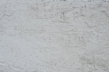 Çizikler ve çatlaklar ile duvar parçası. Arka plan olarak kullanılabilir