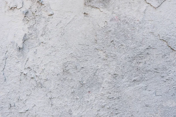 Çizikler ve çatlaklar ile duvar parçası. Arka plan olarak kullanılabilir