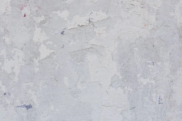 Çizikler ve çatlaklar ile duvar parçası. Arka plan olarak kullanılabilir