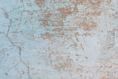 Çizikler ve çatlaklar ile duvar parçası. Arka plan olarak kullanılabilir