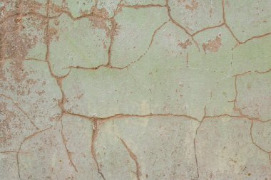 Çizikler ve çatlaklar ile duvar parçası. Arka plan olarak kullanılabilir
