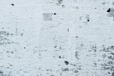 Çizikler ve çatlaklar ile duvar parçası. Arka plan olarak kullanılabilir