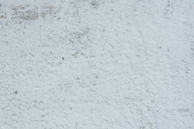 Çizikler ve çatlaklar ile duvar parçası. Arka plan olarak kullanılabilir