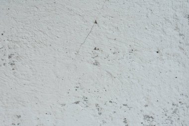 Çizikler ve çatlaklar ile duvar parçası. Arka plan olarak kullanılabilir