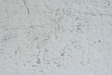 Çizikler ve çatlaklar ile duvar parçası. Arka plan olarak kullanılabilir