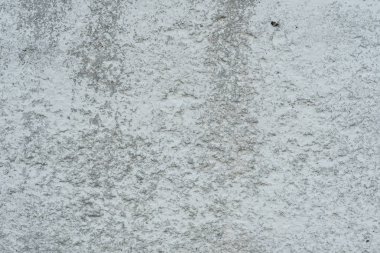 Çizikler ve çatlaklar ile duvar parçası. Arka plan olarak kullanılabilir