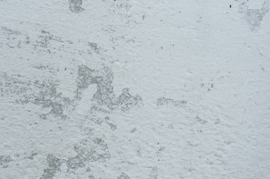 Çizikler ve çatlaklar ile duvar parçası. Arka plan olarak kullanılabilir