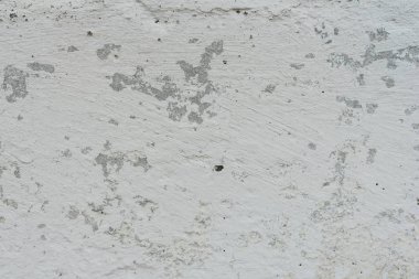 Çizikler ve çatlaklar ile duvar parçası. Arka plan olarak kullanılabilir