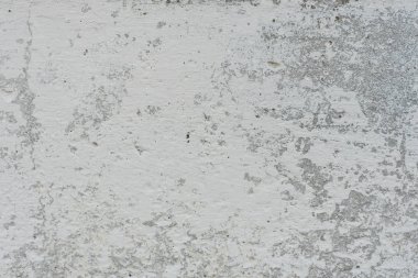 Çizikler ve çatlaklar ile duvar parçası. Arka plan olarak kullanılabilir