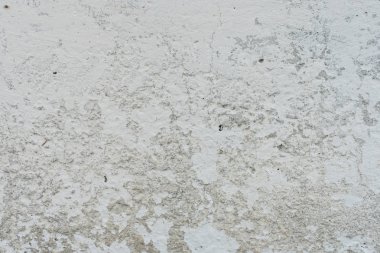 Çizikler ve çatlaklar ile duvar parçası. Arka plan olarak kullanılabilir