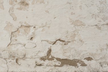 Çizikler ve çatlaklar ile duvar parçası. Arka plan olarak kullanılabilir