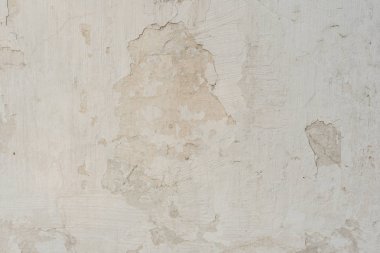 Çizikler ve çatlaklar ile duvar parçası. Arka plan olarak kullanılabilir