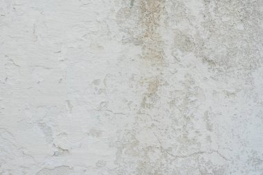 Çizikler ve çatlaklar ile duvar parçası. Arka plan olarak kullanılabilir
