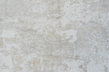 Çizikler ve çatlaklar ile duvar parçası. Arka plan olarak kullanılabilir