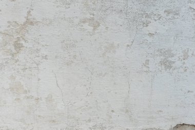 Çizikler ve çatlaklar ile duvar parçası. Arka plan olarak kullanılabilir