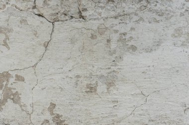 Çizikler ve çatlaklar ile duvar parçası. Arka plan olarak kullanılabilir