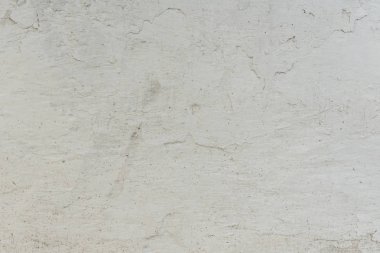 Çizikler ve çatlaklar ile duvar parçası. Arka plan olarak kullanılabilir